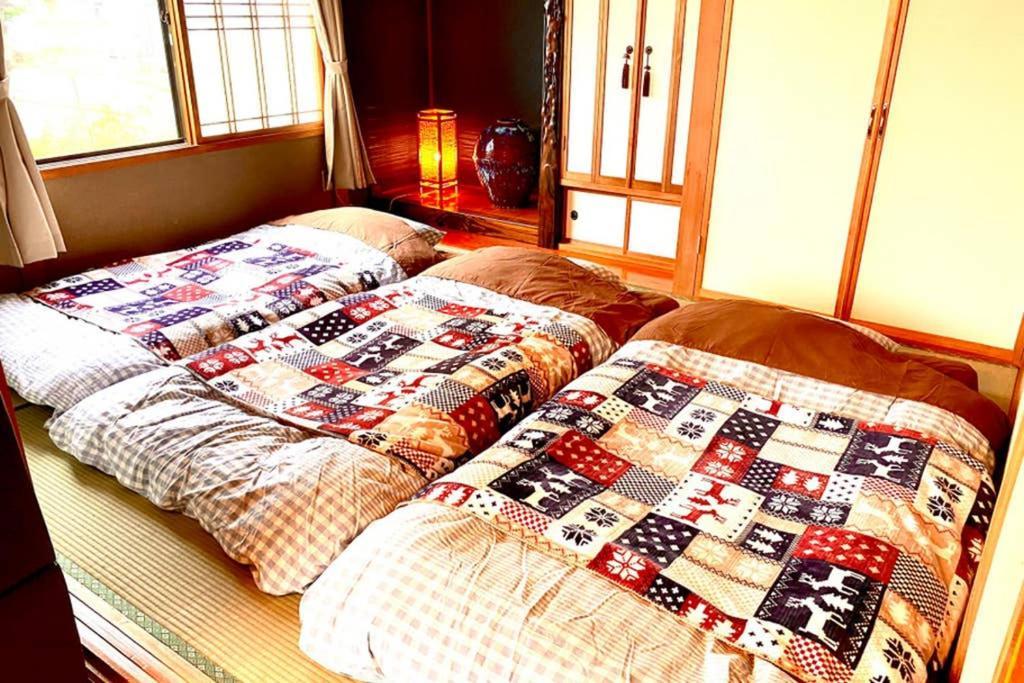 Manyi'S Onsen House 天然温泉マンイの湯 Villa Shiraoi Buitenkant foto