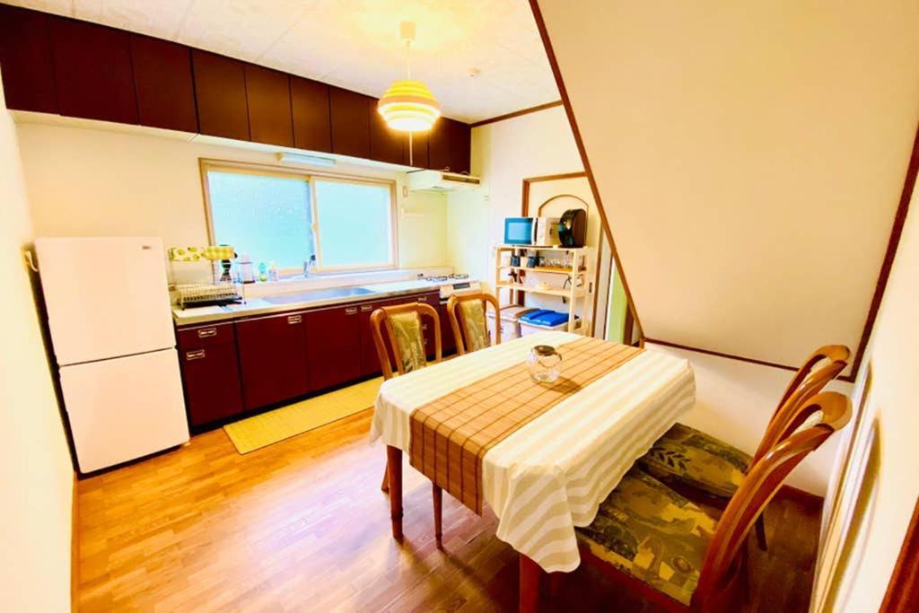 Manyi'S Onsen House 天然温泉マンイの湯 Villa Shiraoi Buitenkant foto