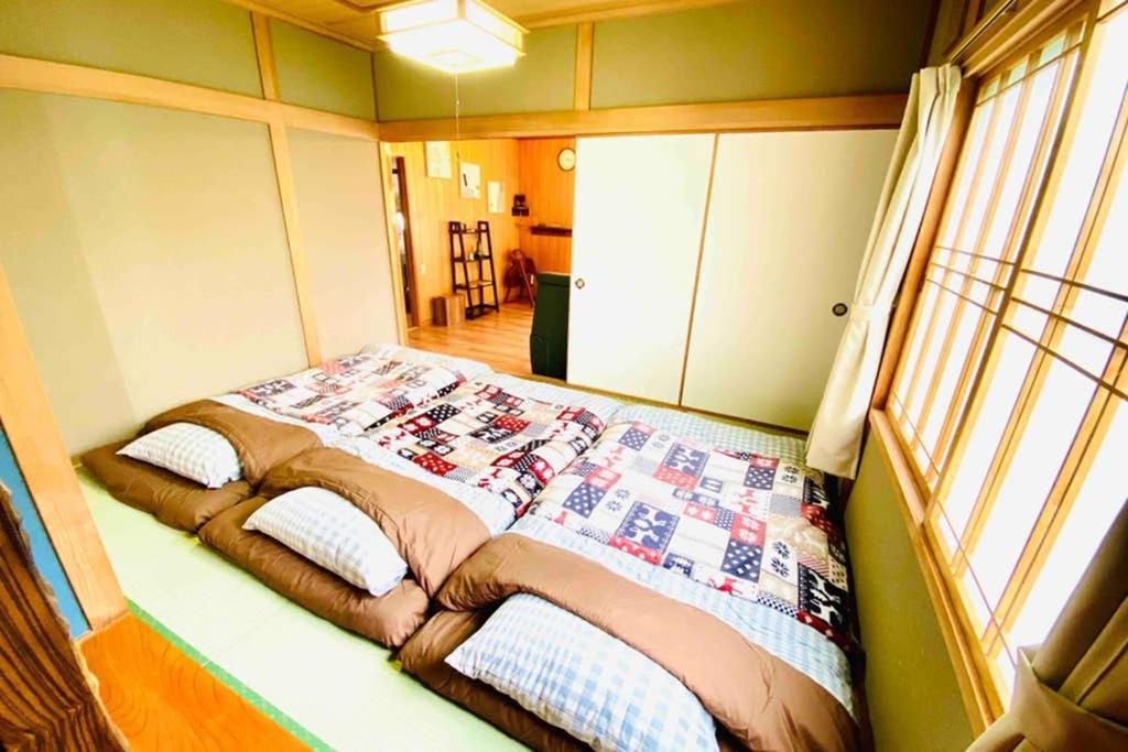 Manyi'S Onsen House 天然温泉マンイの湯 Villa Shiraoi Buitenkant foto